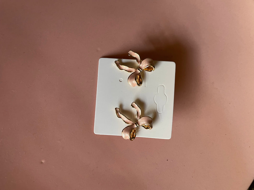 Pink bow studs